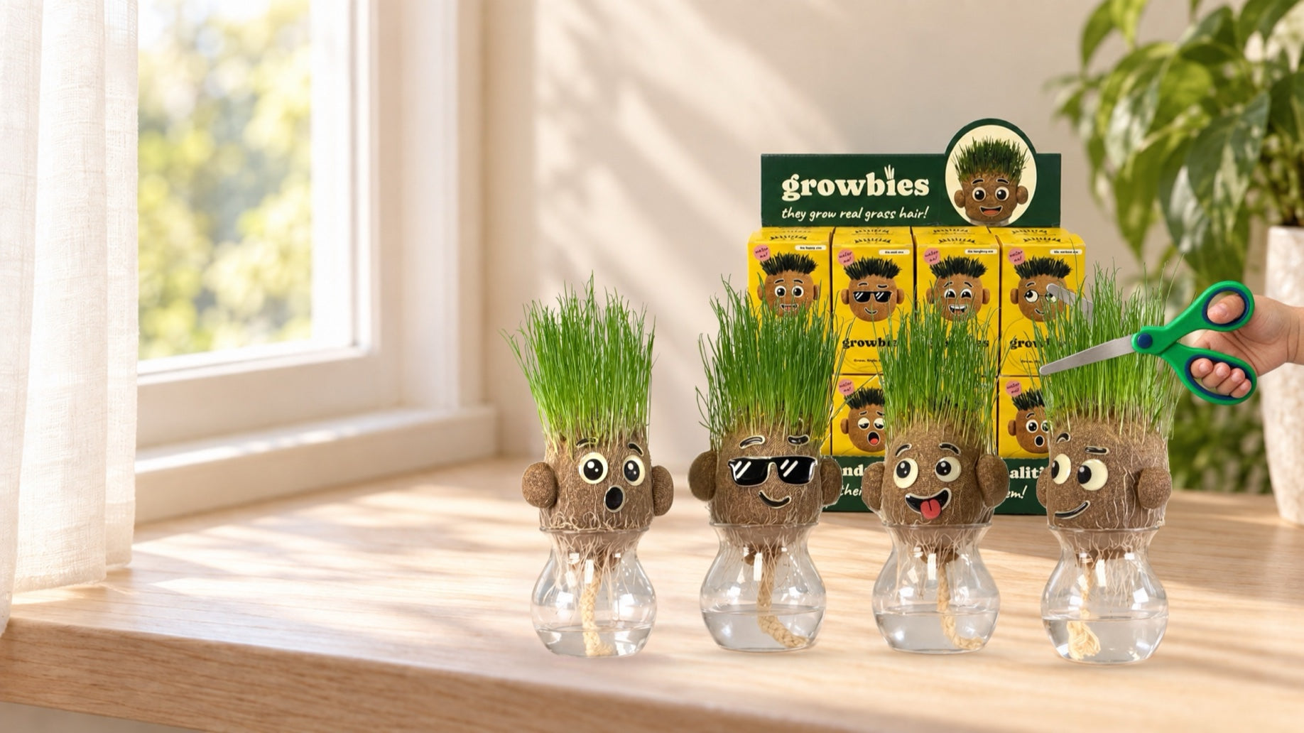 Growbies with real grass hair on a party table